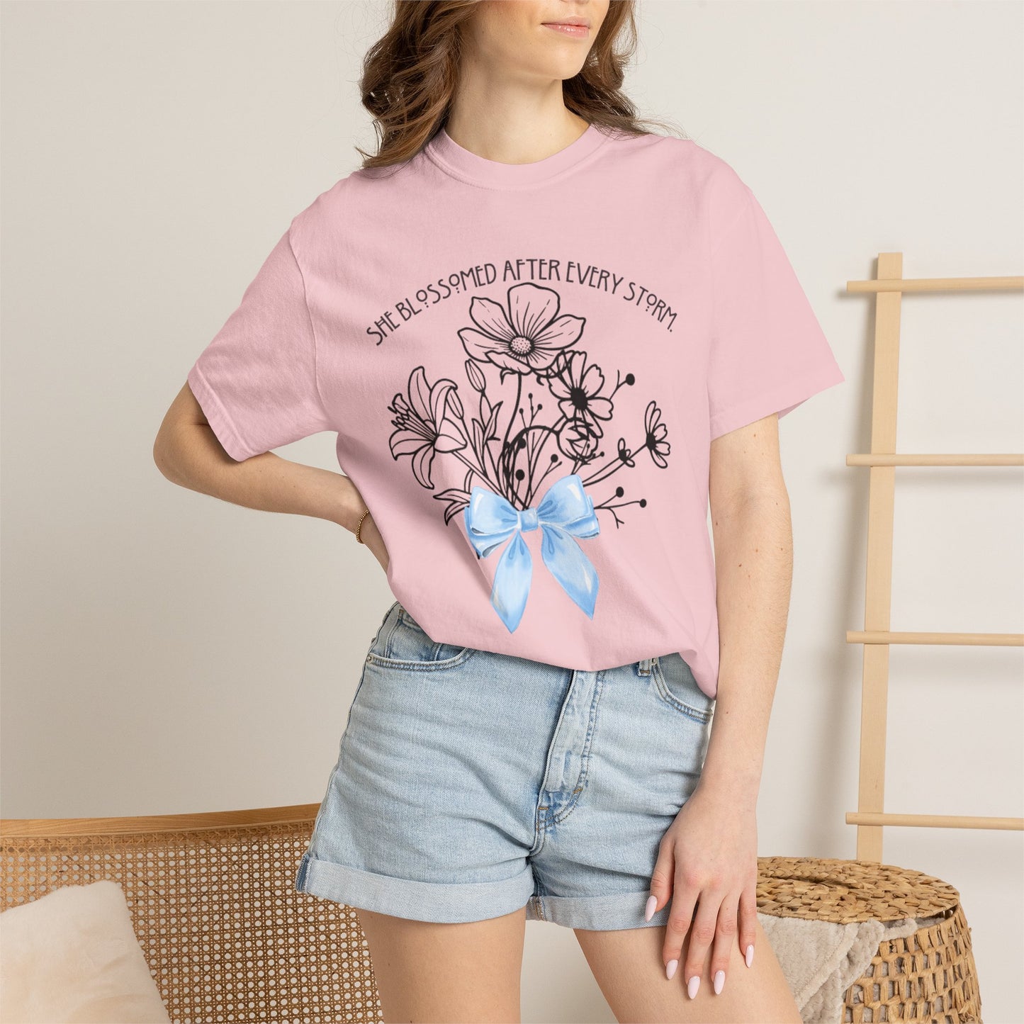 T-Shirt — 'She Blossomed After Every Storm' Floral Bouquet Tee with Blue Ribbon